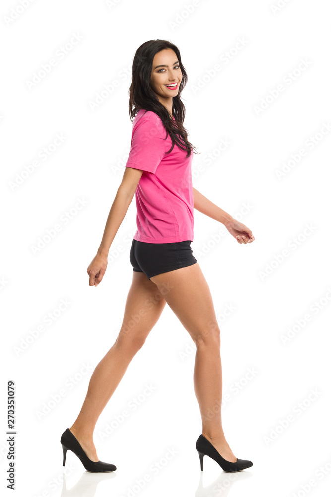 Beautiful Young Woman Is Walking And Laughing Beautiful Young Woman Is Walking And Laughing