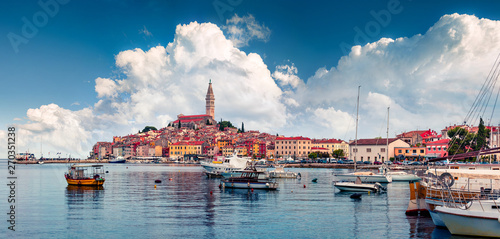 Wonderful spring cityscape of Rovinj town, Croatian fishing port on the west coast of the Istrian peninsula. Colorful morning seascape of Adriatic Sea. Traveling concept background.