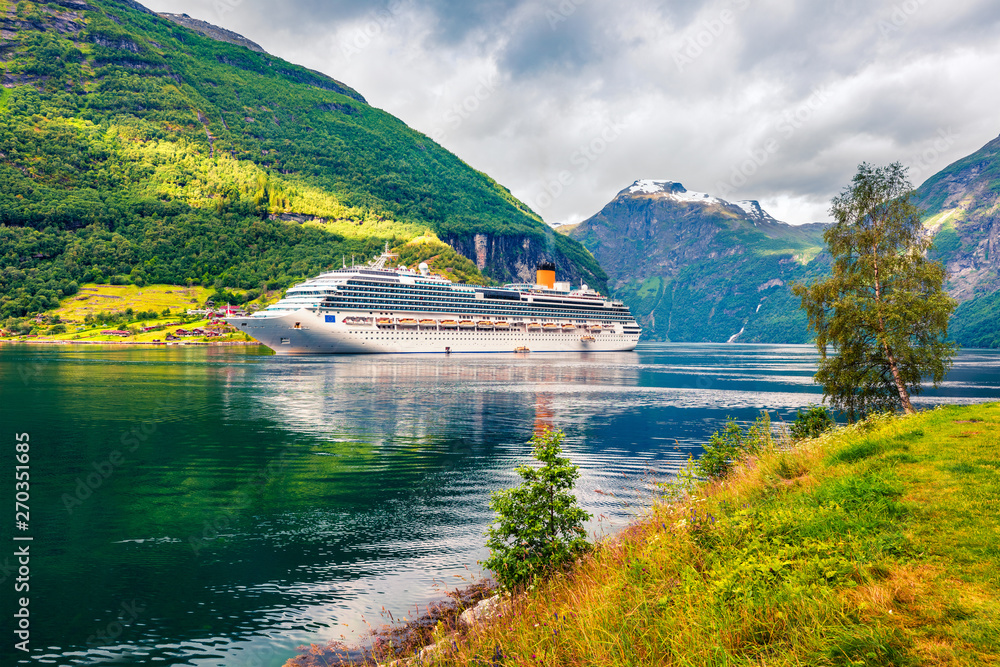 Sunny summer scene of Geiranger port, western Norway. Colorful view of Sunnylvsfjorden fjord. Traveling concept background. Artistic style post processed photo. - obrazy, fototapety, plakaty 