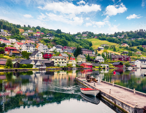 Rainy summer view of Norheimsund village, located on the northern side of the Hardangerfjord. Colorful morning scene in Norway, Europe. Traveling concept background. photo