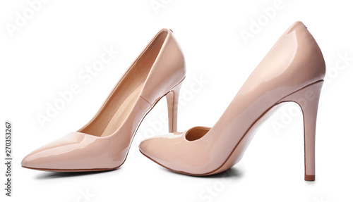 Stylish high-heeled female shoes on white background