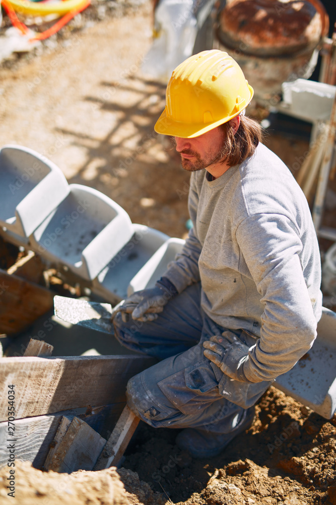 Construction worker on a heavy site doing hard work. Construction worker on a heavy site doing hard work.