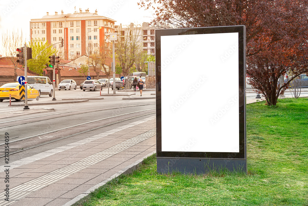 Blank billboard in city traffic Blank billboard in city traffic