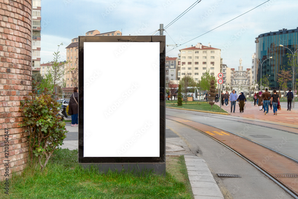 Blank billboard in city traffic Blank billboard in city traffic