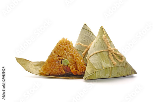 Sticky rice dumpling or Zongzi (Pyramid-shaped dumpling made by wrapping glutinious rice in bamboo leaves) for Chinese Boat dragon festival (5th Lunar month festvial. Isolated on white background. photo