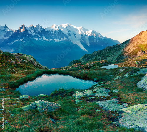 Splendid summer view of the Lac Blanc lake with Mont Blanc (Monte Bianco) on background, Chamonix location. Beautiful outdoor scene in Vallon de Berard Nature Preserve, Graian Alps, France, Europe. © Andrew Mayovskyy
