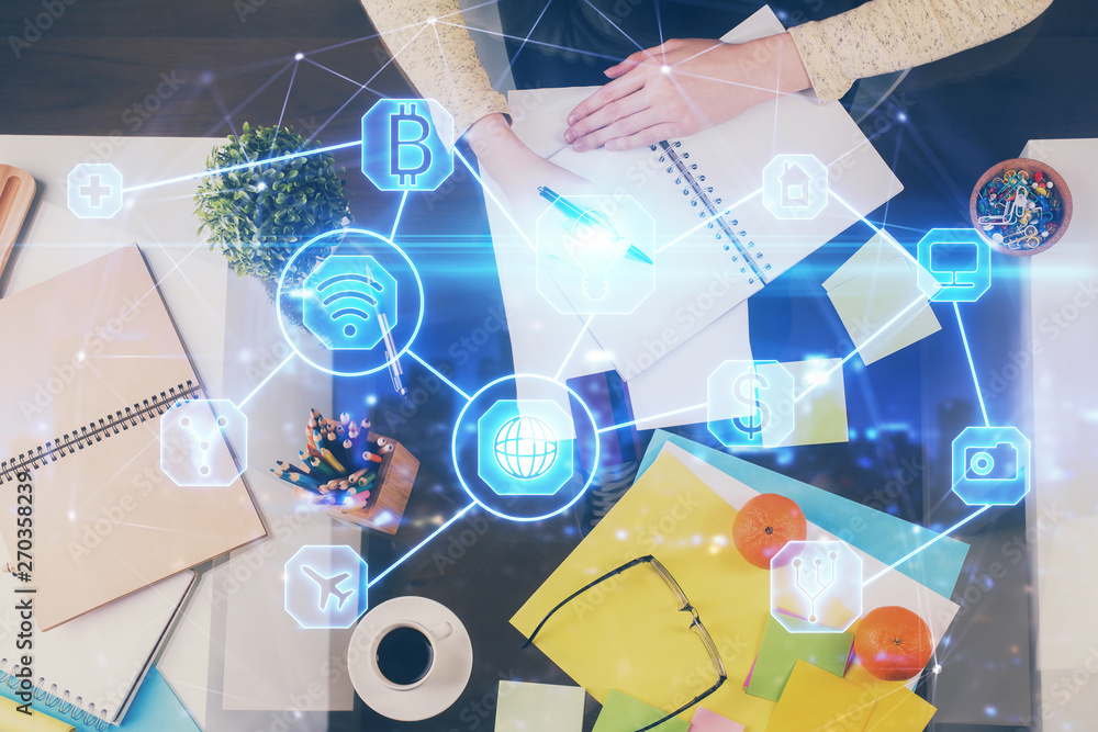 Social network theme hologram over hands taking notes background. Concept of global international people connect. Double exposure Social network theme hologram over hands taking notes background. Concept of global international people connect. Double exposure