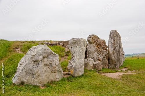 West Kennet Long Barrow is a Neolithic tomb or barrow, situated on a prominent chalk ridge, near Silbury Hill, one-and-a-half miles south of Avebury.