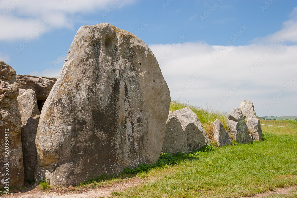 West Kennet Long Barrow is a Neolithic tomb or barrow, situated on a prominent chalk ridge, near Silbury Hill, one-and-a-half miles south of Avebury.