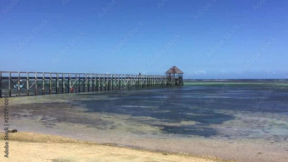 Pier in Fiji on a sunny day. Pier in Fiji on a sunny day.