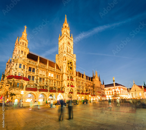 Awesome evening view of Marienplatz - City-center square & transport hub with towering St. Peter's church, two town halls and a toy museum, Munich, Bavaria, Germany, Europe.