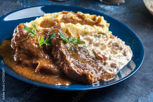 Stewed pork neck with potatoes and sauce