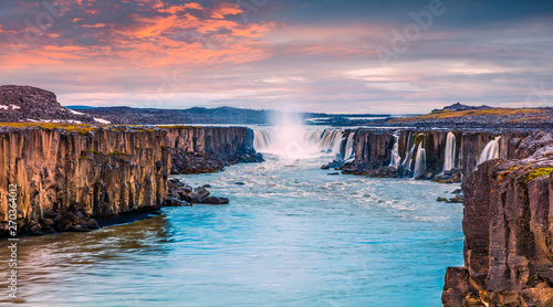 Fototapeta Naklejka Na Ścianę i Meble -  Colorful summer landscape on Jokulsa a Fjollum river. Beautiful sunrise scene on the Selfoss Waterfall in Jokulsargljufur National Park, Iceland, Europe. Beauty of nature concept background.