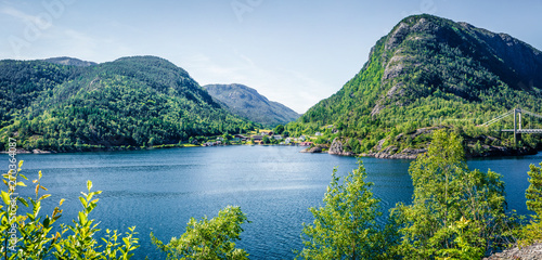 Typical countryside Norwegian landscape. Sunny summer panorama of Norway, Europe. Beauty of countryside concept background. Instagram filter toned. photo