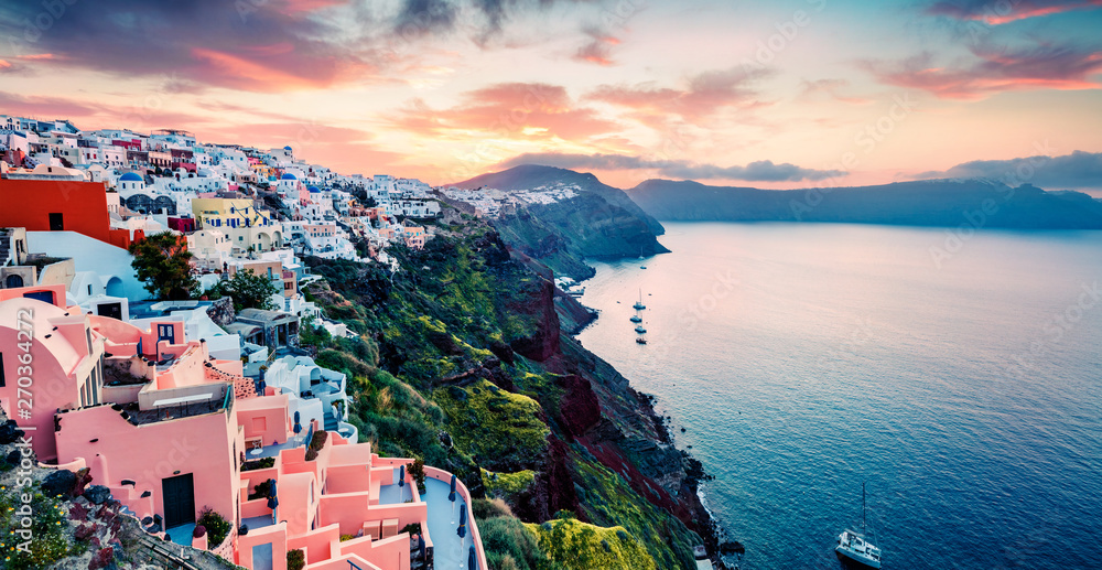 Attractive morning panorama of Santorini island. Picturesque spring sunrise on the famous Greek resort Oia, Greece, Europe. Traveling concept background. Artistic style post processed photo.