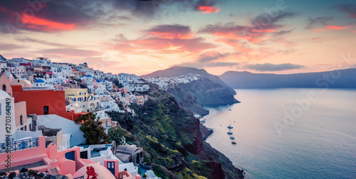 Splendid morning panorama of Santorini island. Picturesque spring sunrise of famous Greek resort Oia, Greece, Europe. Traveling concept background. Artistic style post processed photo.