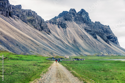 Colorful summer scene of Stokksnes headland on southeastern Icelandic coast. Great morning view of Batman mountain range, Iceland, Europe. Artistic style post processed photo. photo