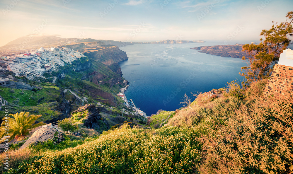 Fabulous morning scene of Santorini island. Great spring view of the famous Greek resort Fira, Greece, Europe. Traveling concept background. Artistic style post processed photo.