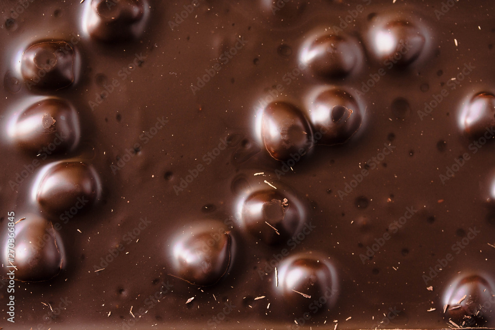 Chocolate bar with nuts background Chocolate bar with nuts background