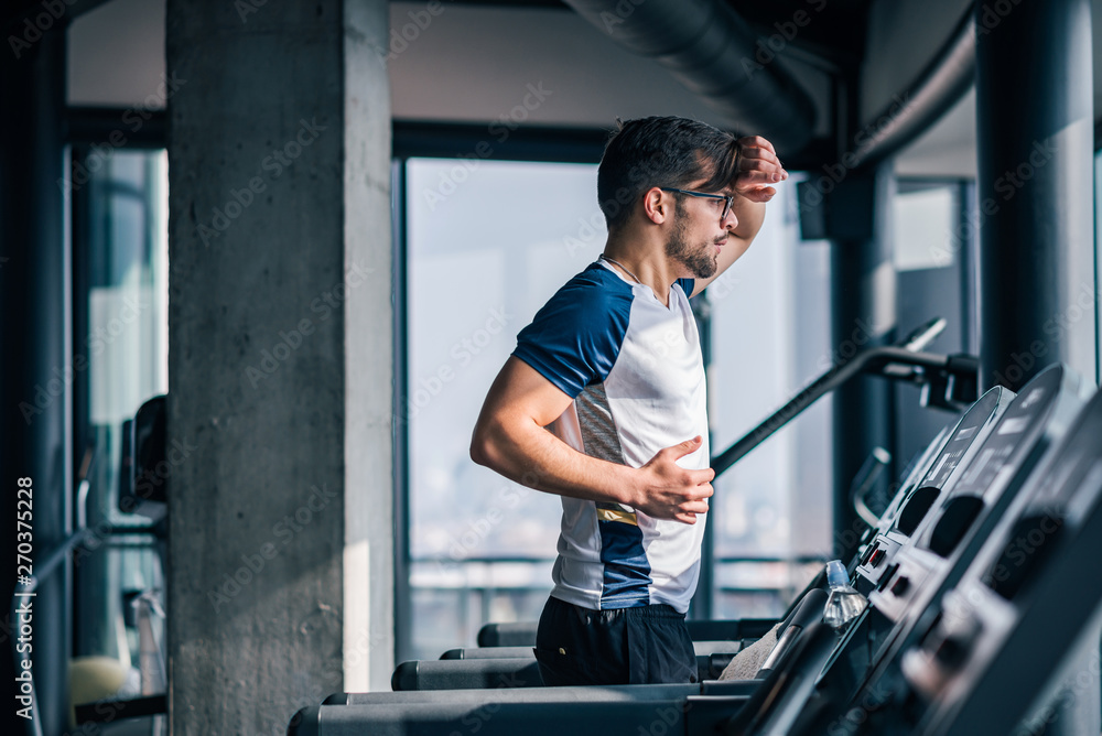 Running on a treadmill on a sunny day. Running on a treadmill on a sunny day.