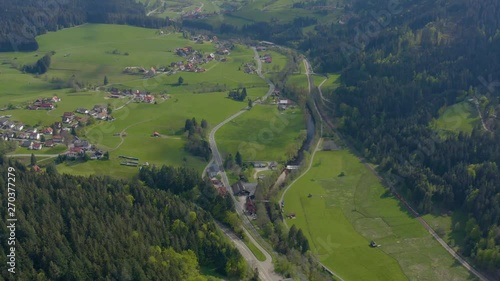 Aerial pan to the right from Schönegründ to the woods in the black forest Schwarzwald photo