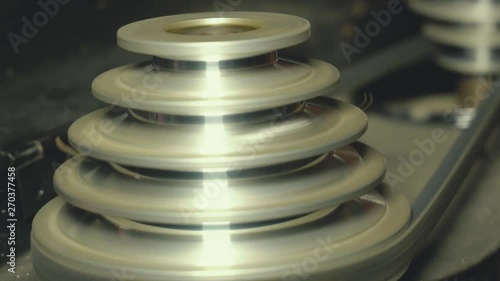 Pulleys with belts on the working machine