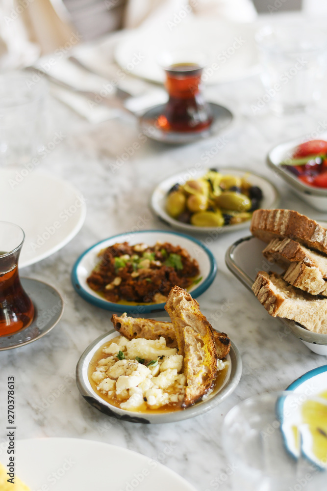 Turkish breakfast with various plates on a table