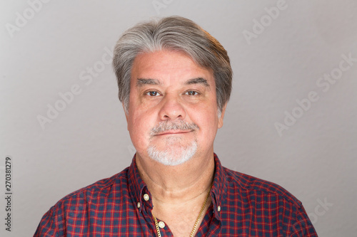 Adult man studio portrait. The image can be used as resource for a particular message based on the content.