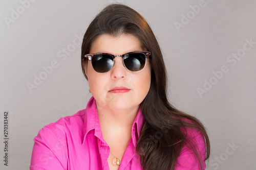 Wallpaper Mural Adult lady in a studio portrait. The image can be used as resource for a particular message based on the content. Torontodigital.ca