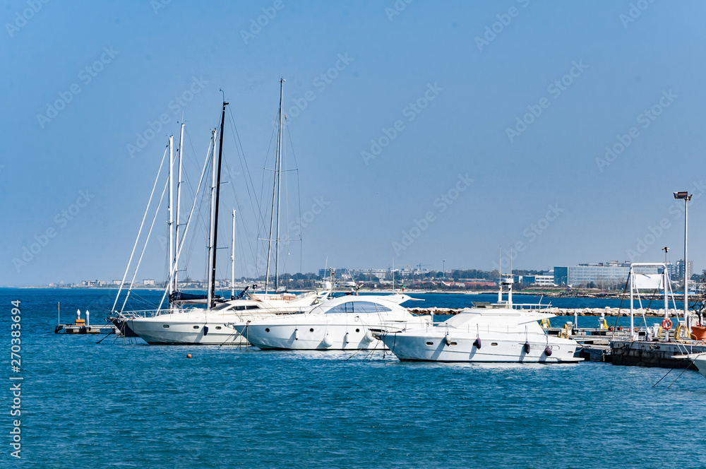 Harbor Bari in Italy with yachts and boats in dock.