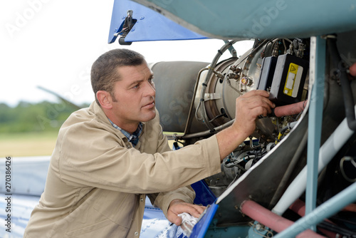 maintenance of the helicopter with parts dissembled
