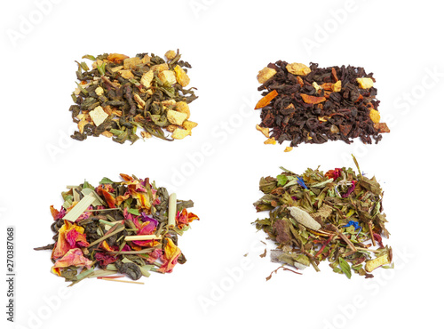 Top view of an assortment of loose tea leaves isolated on white