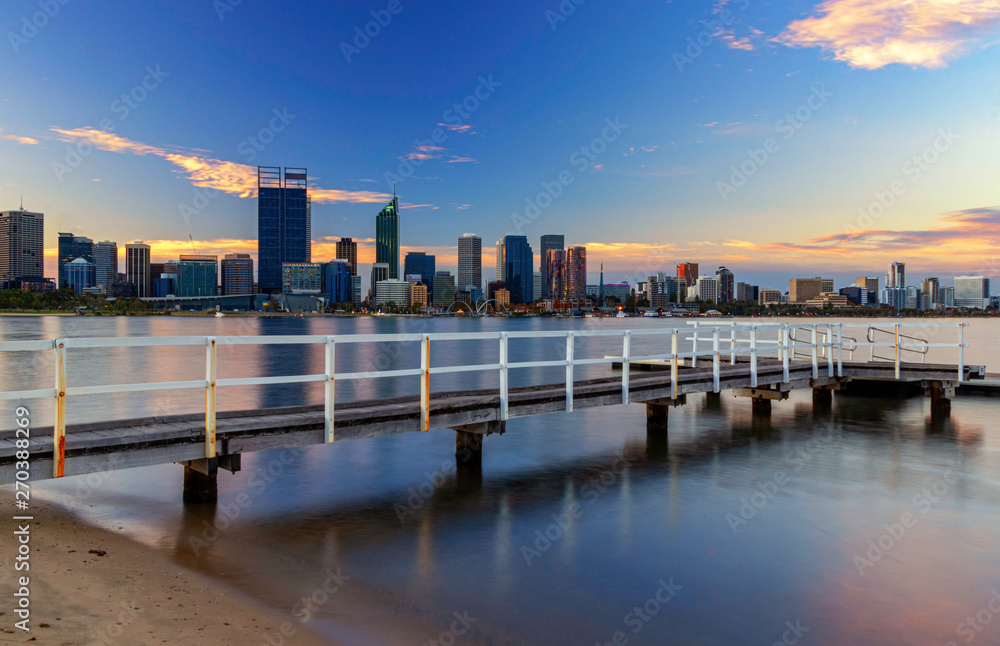 Fototapeta premium Fishing Jetty at Sunset with Perth City in Background at Sunset