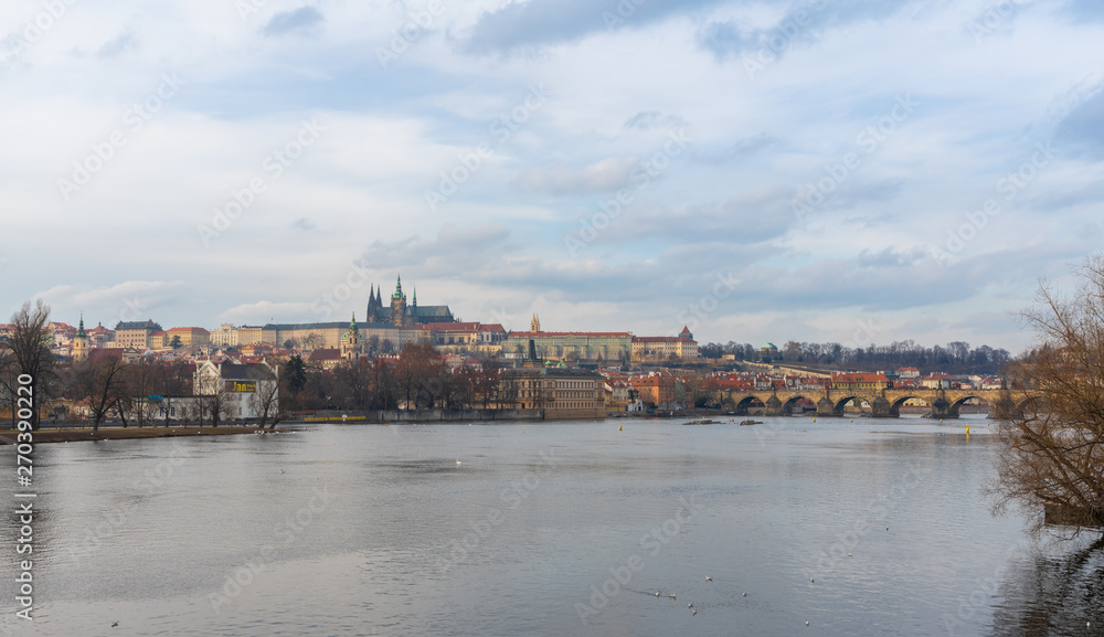 Prague, Czech Republic-January 31, 2019. View of Vltava river and historical, famous Old Town at late afternoon at Winter time on January 31, 2019 in Prague City.