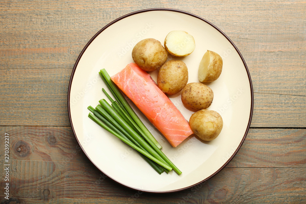 Boiled young potatoes with red fish and green onions Boiled young potatoes with red fish and green onions