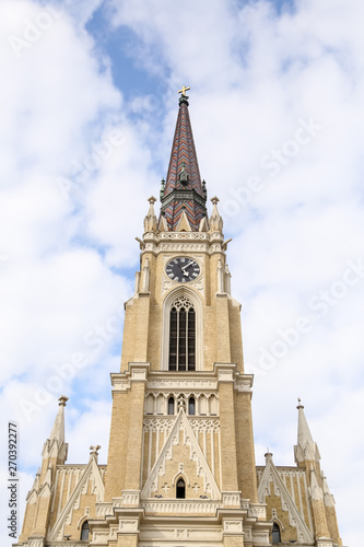 The Name of Mary Church, Novi Sad catholic cathedral during a spring partly cloudy day.