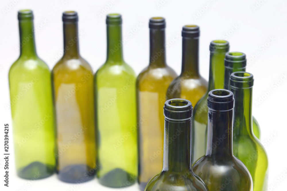 empty bottles of wine on white background. tableware for drinks. empty bottles of wine on white background. tableware for drinks.