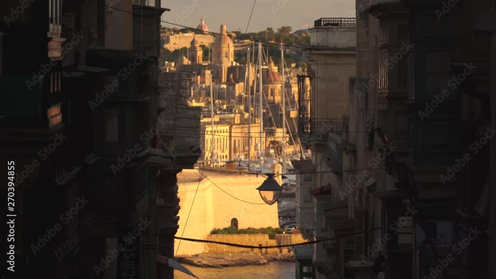 Beautiful medieval narrow streets of the old town and the view of the harbour in Valletta, Malta in 4k Beautiful medieval narrow streets of the old town and the view of the harbour in Valletta, Malta in 4k