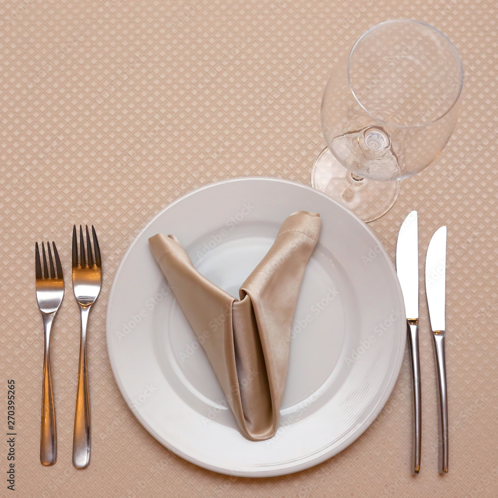 the table setting in restaurant closeup. tableware. the table setting in restaurant closeup. tableware.