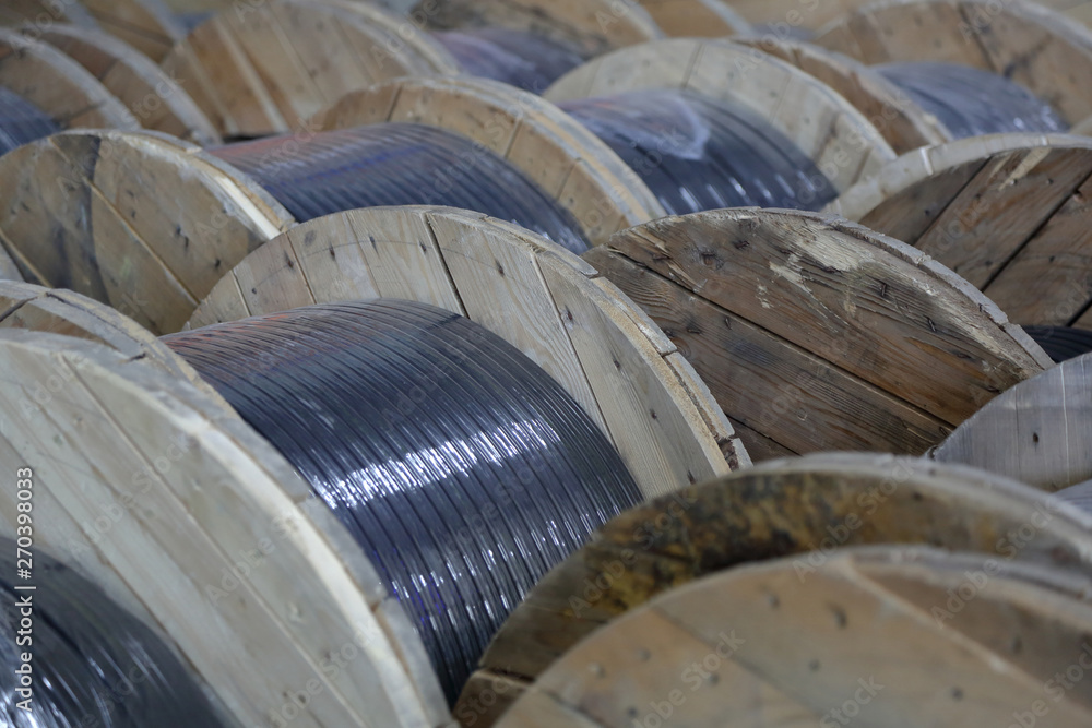 Massive wooden bobbins with wound electric cable Massive wooden bobbins with wound electric cable