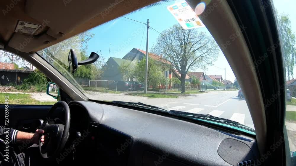 Car Drive Trough Town Passenger Side View