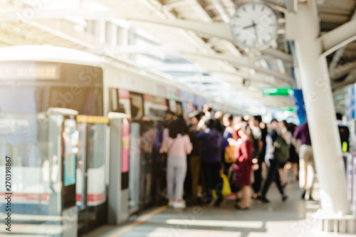 Photography Blurry of people getting on and getting out electric skytrain with automatic gat
