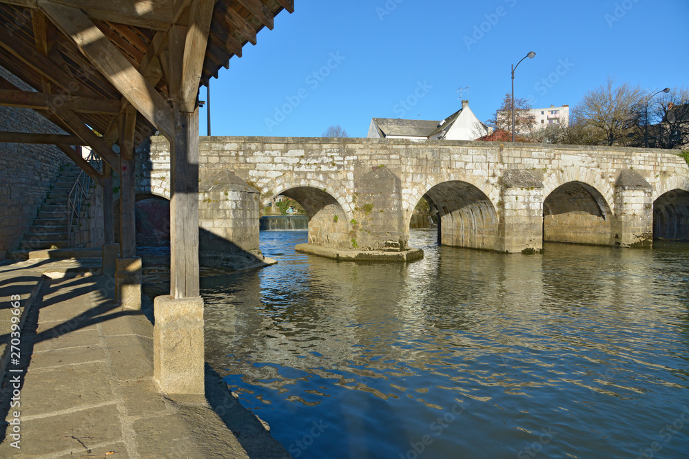 Fototapeta premium Old bridge and wash house on the Sarthe at Alençon of the Lower Normandy region in France
