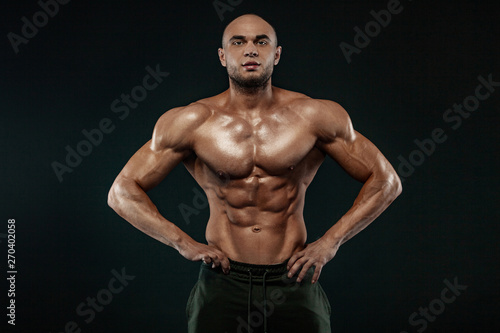 Bodybuilding competitions on the scene. Man sportsmen bodybuilder physique and athlete. Fitness motivation.