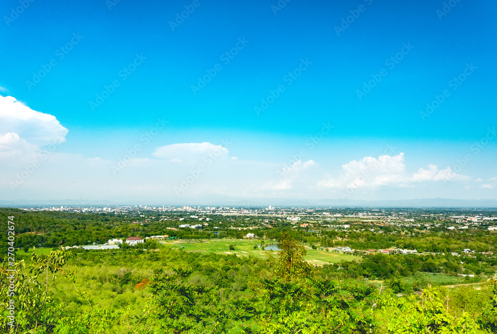 Fototapeta premium The beautiful mountain landscape has a hilltop covered with forests and cloudy skies in Thailand.