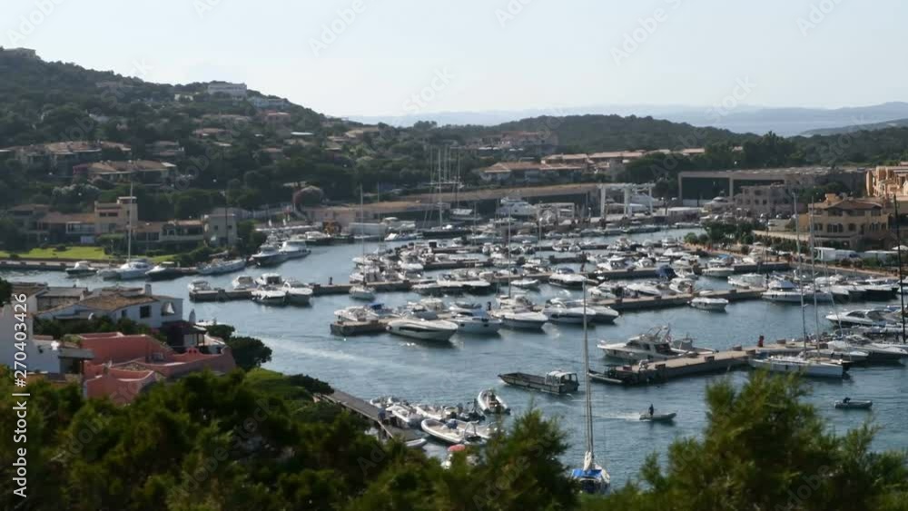 Panoramic view of an entrance to a seaport with boat traffic Mediterranean sea. Panoramic view of an entrance to a seaport with boat traffic Mediterranean sea.