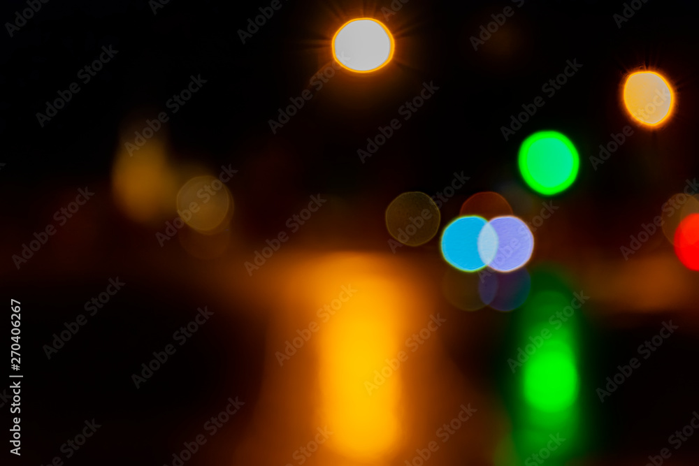 Festive night lights in the city. - obrazy, fototapety, plakaty 