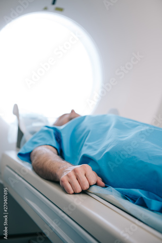 selective focus of patient having mri scanning test in hospital