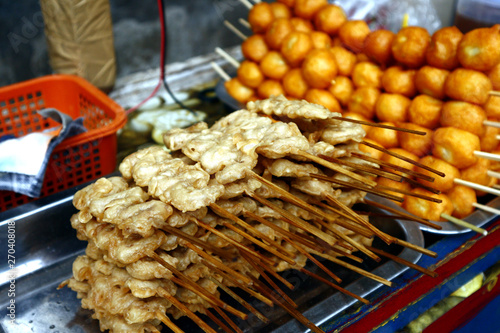 Assorted chicken innards sold at a food kiosk photo