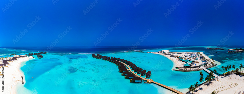 Aerial view, under construction Maldives island with water bungalows, South Male Atoll Maldives, Mar 2019